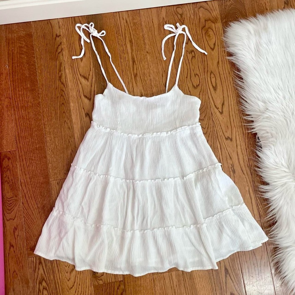 White babydoll dress with ruffles and tie straps